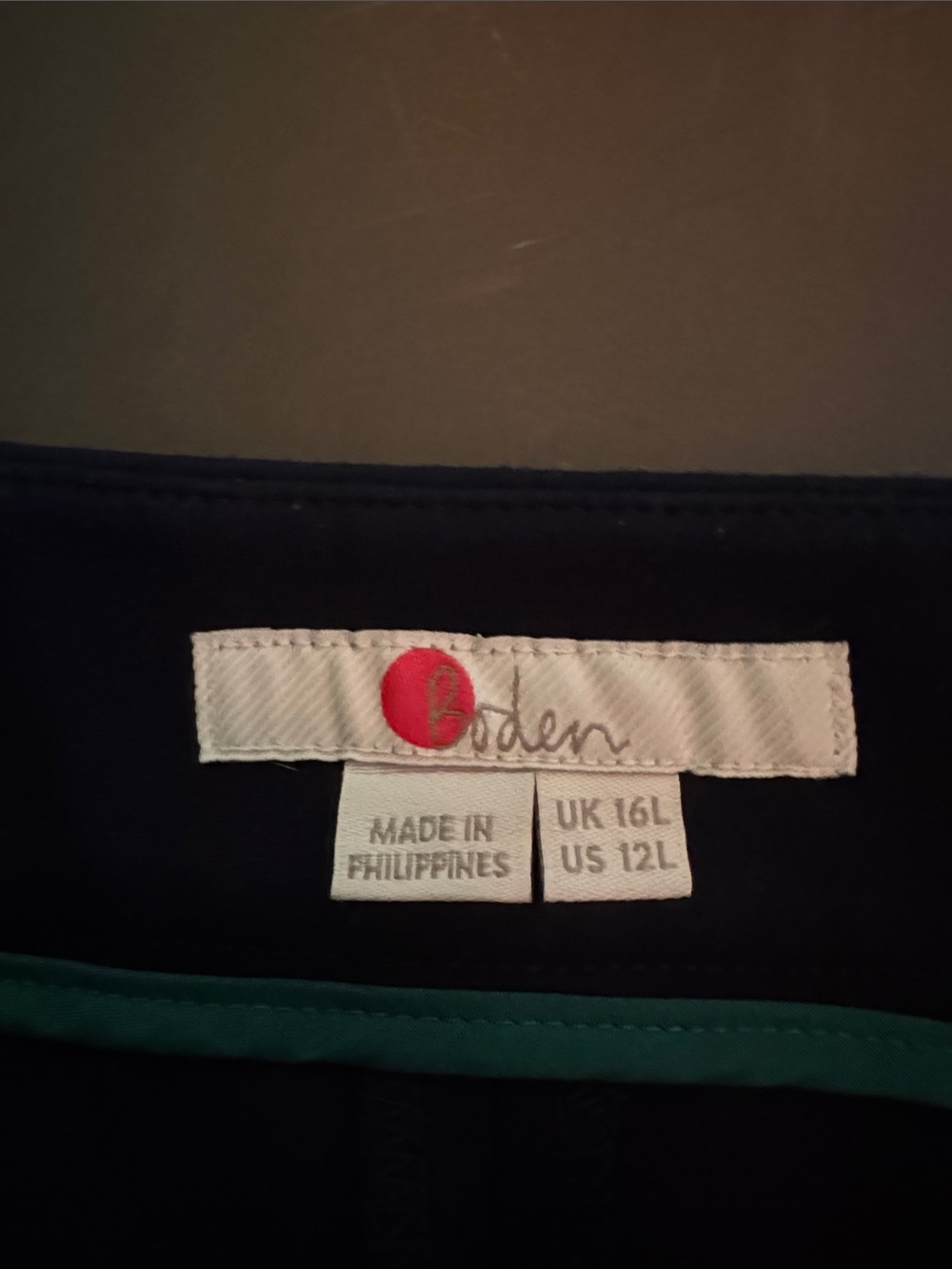 Boden Black Garment with Red and Green Trim. Wide leg with zip ankle detail. - Picture 2 of 5